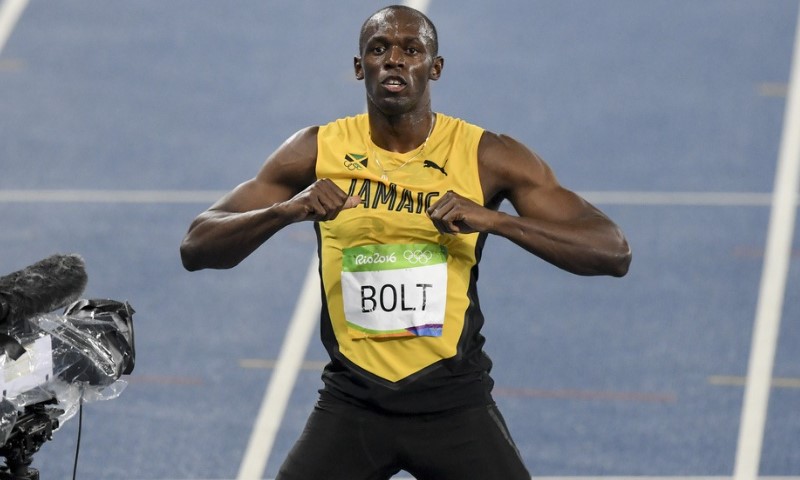 Jusein Bolt slavi pobedu nakon trke